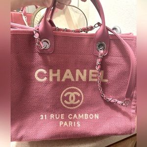 Brand new Chanel Large Tote in pink! Never been used or worn! Mint condition!!